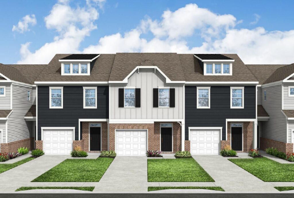 A row of modern Fairlie townhouses with two floors and attached garages. Their front lawns are neatly manicured, featuring small paths leading to each entrance under a partly cloudy sky.